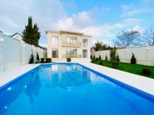 Merdekan qesebesinde Bravo market ətrafında 7 sot torpaq sahesinde insa edilmiş 2 mertebeli villa, -2