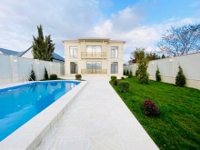 Merdekan qesebesinde Bravo market ətrafında 7 sot torpaq sahesinde insa edilmiş 2 mertebeli villa, -3