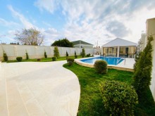 Merdekan qesebesinde Bravo market ətrafında 7 sot torpaq sahesinde insa edilmiş 2 mertebeli villa, -5