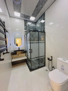 продается новый дом с просторным двором и светлыми комнатами в Баку, -19