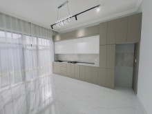 Mərdəkanda  Bravo market və TT market ətrafında yola yaxın modern villa satılır, -17