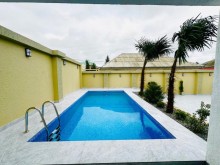 Mərdəkan qəsəbəsində 4 sot torpaq sahəsində yerləşən 1 mərtəbəli, modern satılır, -5