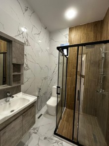 Mərdəkan qəsəbəsində 4 sot torpaq sahəsində yerləşən 1 mərtəbəli, modern satılır, -19